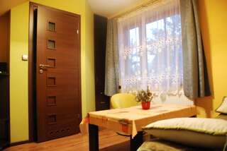 Проживание в семье Pokoje i Apartamenty u Architekta Чарна-Гура Четырехместный номер-11
